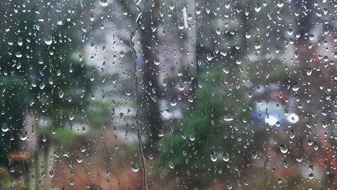 Look out the room to the raindrops Stock Footage 104042754
