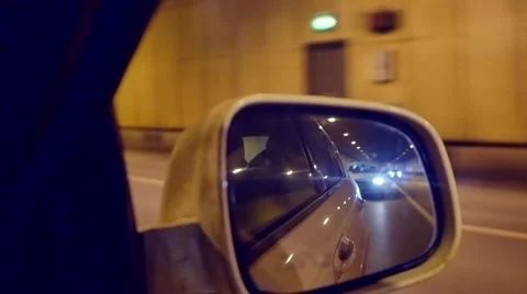 Look in the rear-view mirror from the car. Night taxi. Video stock 58492287