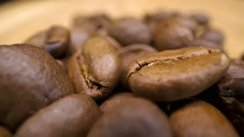 The look of the roasted coffee beans on the table Stock Footage 135703371