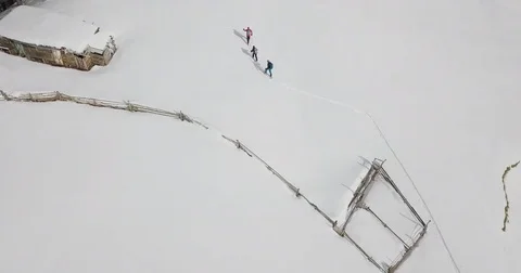 Look-up shot on some ski-touring men and mountains. Stock Footage 85084376
