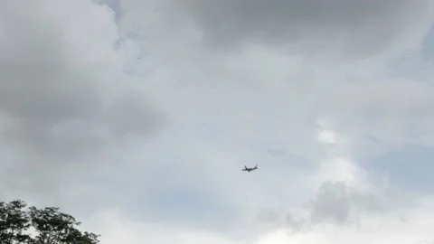 Look up to the sky while comercial passenger airplane is flying Stock Footage 218362220