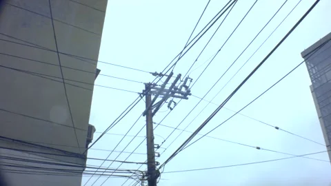 Look up slight movement view of an old vintage simple electricity pole  Stock Footage 204484339