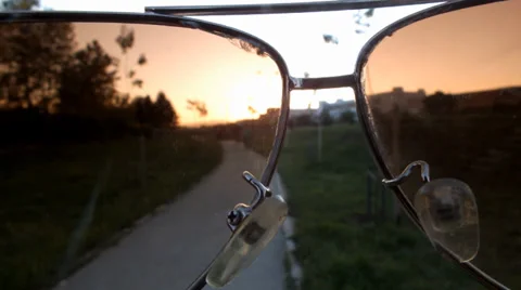 Look through the glasses on the path that people walk around in the last moments 스톡 동영상 37849140