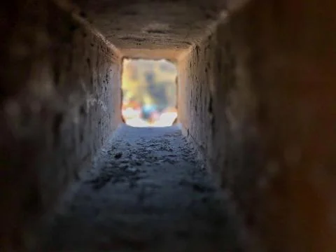 Look through the inside of rectangle brick hole Stock Photos