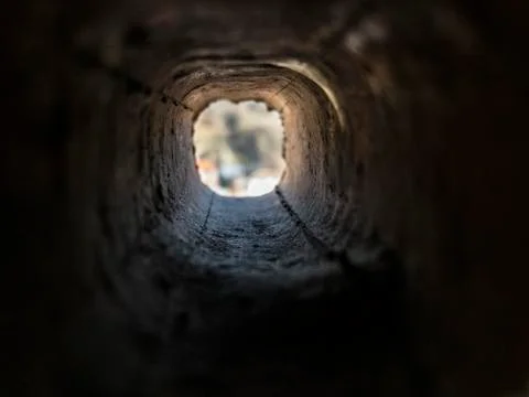Look through the inside of square brick hole Stock Photos