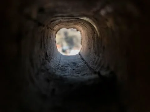Look through the inside of square brick hole Stock Photos