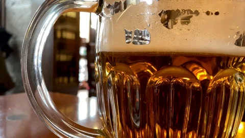 Look through one glass of beer Stock Footage 122360163