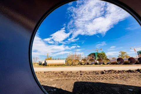 Look through stone pipes with resistant glaze placed on the ground in front.. Stock Photos