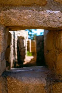 Look through stone window ancient ruins of temple walls in mesa verde nationa Stock Photos