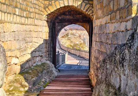 A look thru an opened stone gate Stock Photos