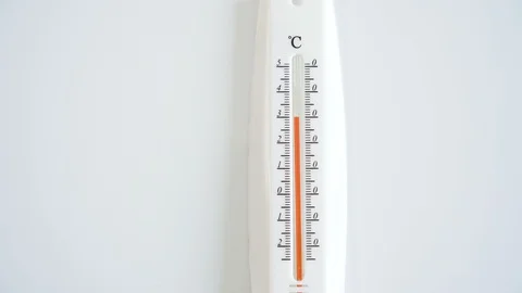 The look of the white room thermometer on the white table Stock Footage 129859439