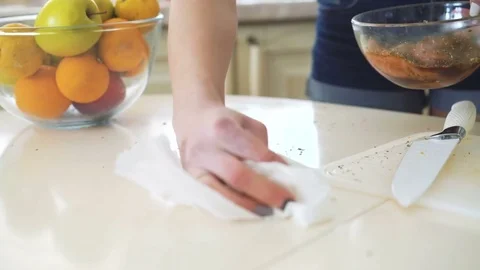 Look of wiping the table on the kitchen in 4K Video stock 72632584