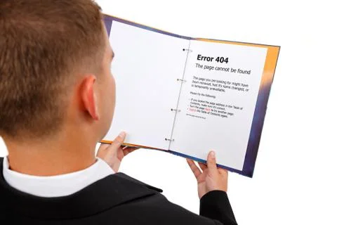 Looking at 404 error page in book Stock Photos
