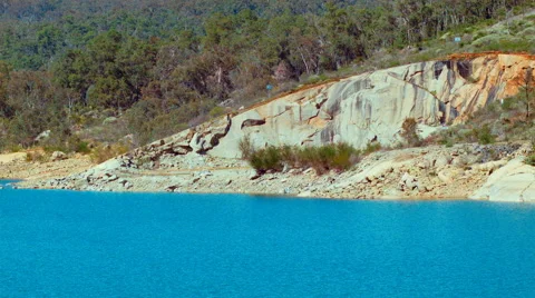 Looking Across Lake C.Y. O'Connor in Western Australia to a Rocky Shore Stock Footage 50987224
