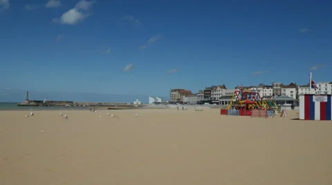 Looking across the relatively empty beach of Margate Main Sands Stock Footage 67578243