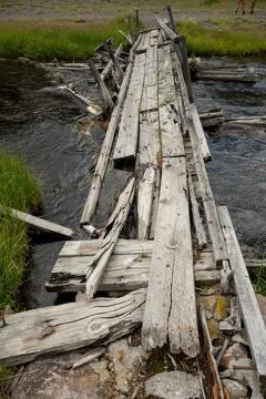 Looking Across Severly Damaged Bridge Along Mary Mountain Trail Stockfoto's