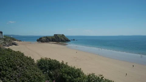 Looking across South Beach to St Catherine’s Island Tenby Pembrokeshire Wales Stock Footage 113672785