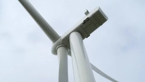 Looking up at an active wind turbine Stock Footage 332134972