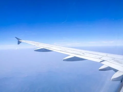 The looking at aircraft wing view from windows Stock Photos