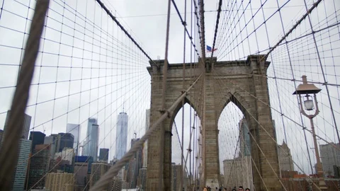 Looking up at The American Flag Flying On the Brooklyn Bridge, Brooklyn ,USA Stock Footage 109368012