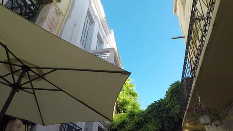 Looking up and Walking Through old Narrow Greek Streets Stock Footage 91780125