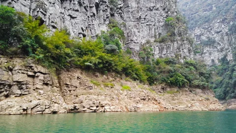 Looking around on both sides of a river Stock Footage 104411106