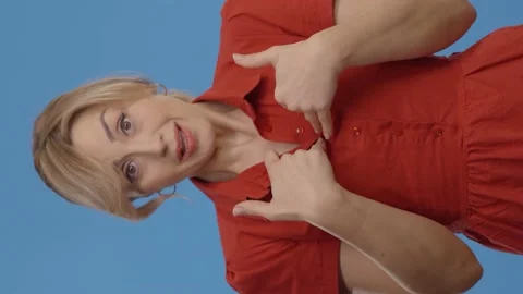 Looking aside, stretch out your hands and raise the chin. Stock Footage 152020500