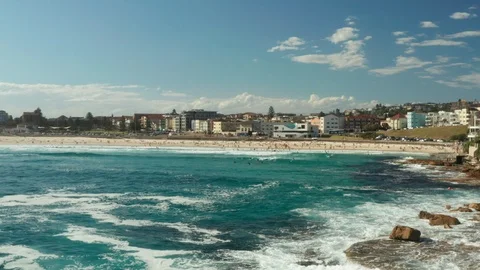 Looking back over Bondi Beach and the Bondi Beach Pavillion Stock Footage 102475881