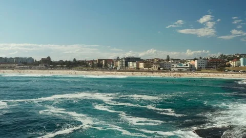 Looking back over Bondi Beach and the Bondi Beach Pavillion Stock Footage 102477246