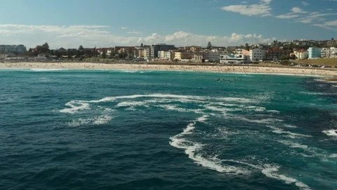 Looking back over Bondi Beach and the Bondi Beach Pavillion Stock Footage 102477508