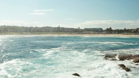 Looking back over Bondi Beach and the Bondi Beach Pavillion Stock Footage 102477896