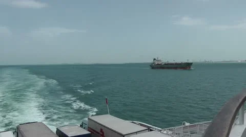 Looking back from rear deck of ferry leaving Dunkirk France for Dover Stock Footage