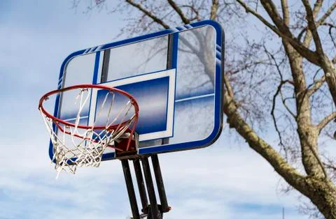 Looking up at basketball ring Stock Photos
