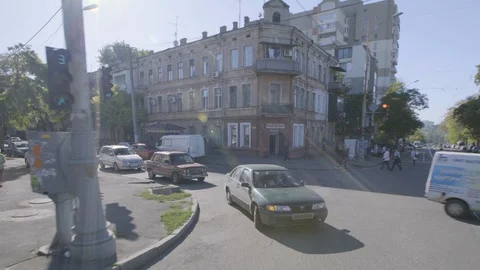 Looking behind car while driving down street in downtown Odessa Ukraine 4K Видео 122545174