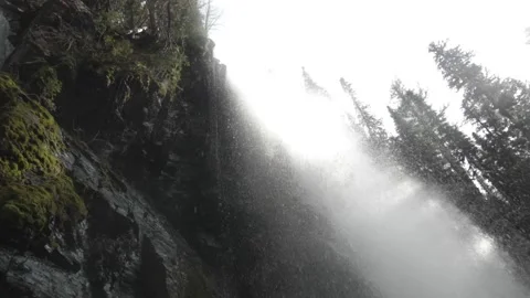 Looking up from below at a waterfall in the Pacific Northwest Stock Footage 144413287