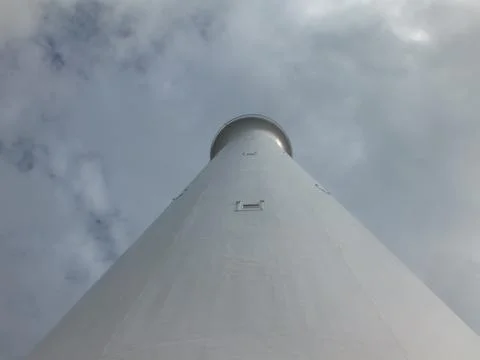 Looking Up at a Bermuda Lighthouse and Cloudy Sky Stock Photos