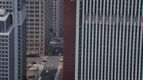 Looking between building in NYC financial district Stock Footage 135945499
