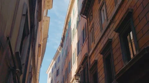 Looking Up Between Historic Buildings on a Narrow Rome Street 스톡 동영상 338071971