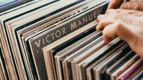 Looking between old vinyl records Stock Footage 105865119