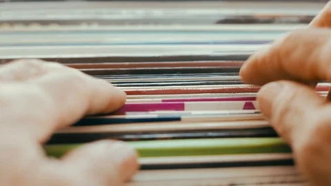 Looking between old vinyl records Stock Footage 105865128