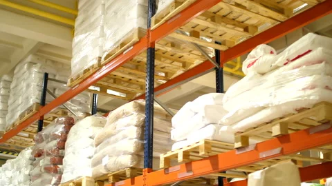 Looking on a big stacks on a warehouse in warm light Stock Footage 150517244