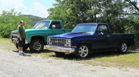 Looking at blue truck Stock Footage 11476370