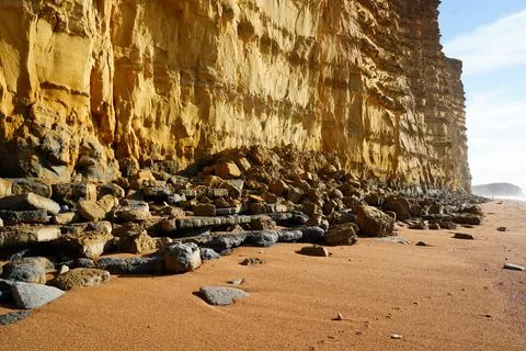 Looking at the bottom of a cliff face 库存照片