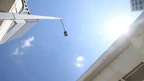 Looking up the clear blue sky in the city of Tokyo. Stock Footage 220096859