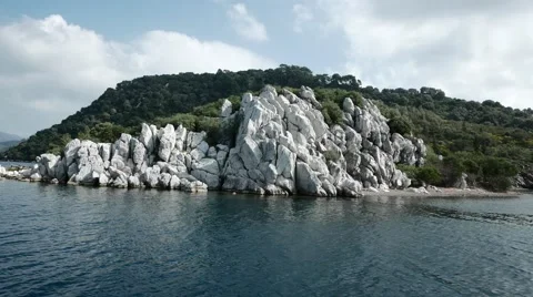 Looking at the Cliffed Land During Sailing. 4k Stock Footage 61435457