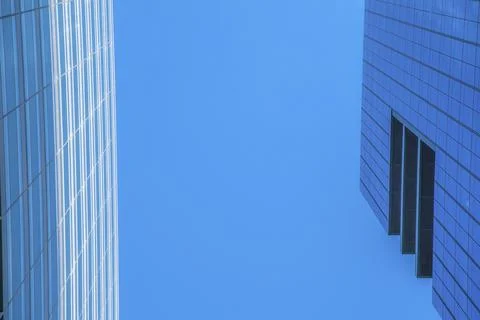 Looking up at the cloudless blue sky over modern buildings in Austin Texas Stock Photos