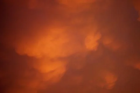 Looking up at clouds at Sunset Stock Photos