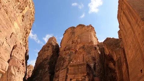 Looking at the cloudscape above the sandstone cliffs and ancient tombs in Stock Footage 172920054