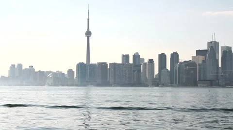 Looking at the CN Tower across lake Ontario Stock Footage 8569048