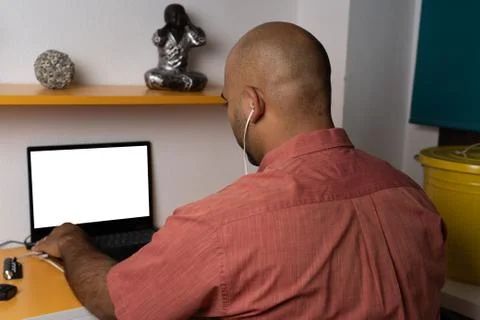 Looking at computer with headsets Stock Photos